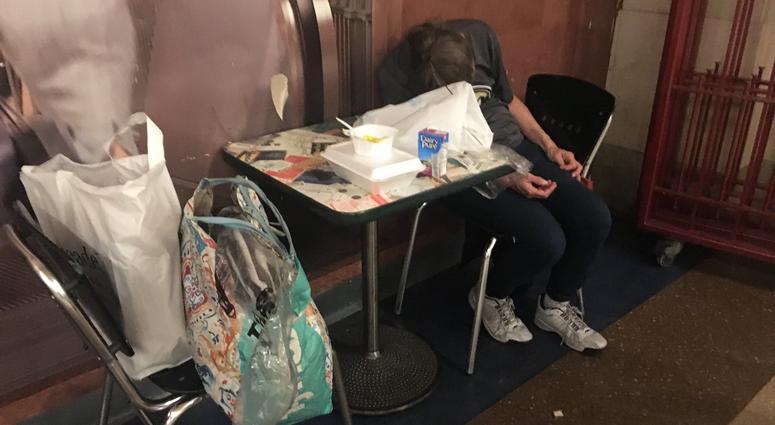 A homeless New Yorker sleeps in Grand Central Terminal on July 24, 2019. Homeless Subways