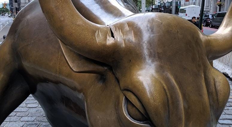 Damaged Charging Bull statue Damaged Charging Bull