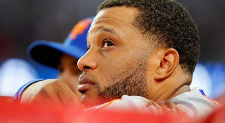Robinson Cano #24 of the New York Mets looks on in the ninth inning against the Atlanta Braves at SunTrust Park on June 19, 2019 Robinson Cano #24 of the New York Mets looks on in the ninth inning against the Atlanta Braves at SunTrust Park on June 19, 2019
