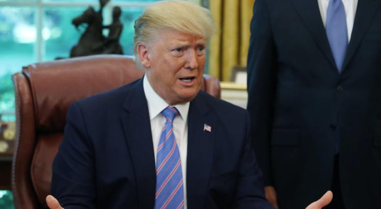 President Donald Trump speaks to the media after signing a bill for border funding in the Oval Office at the White House on July 1, 2019 in Washington, DC. President Donald Trump
