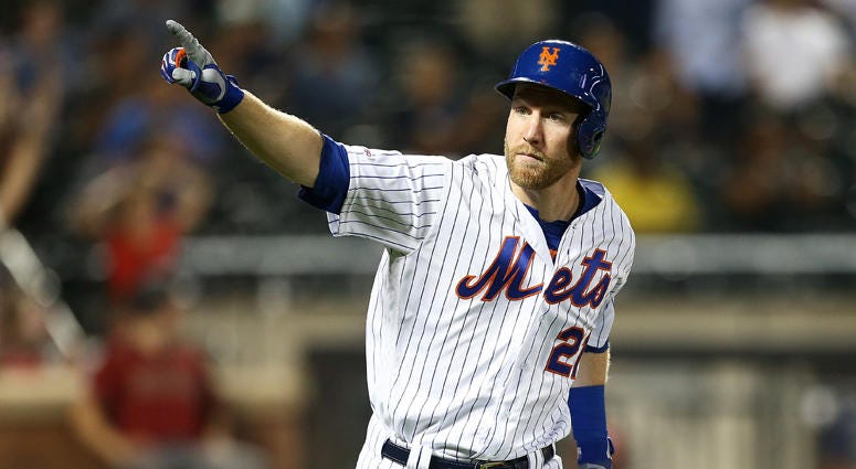 Todd Frazier #21 of the New York Mets celebrates after hitting a two-run home run in the first inning to center field against the Arizona Diamondbacks at Citi Field on September 11, 2019 in Queens. Todd Frazier