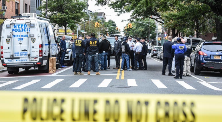 A crime scene is established in front of the Triple A Aces social club on Utica Avenue on October 12, 2019 in New York City. Brooklyn gambling club shooting