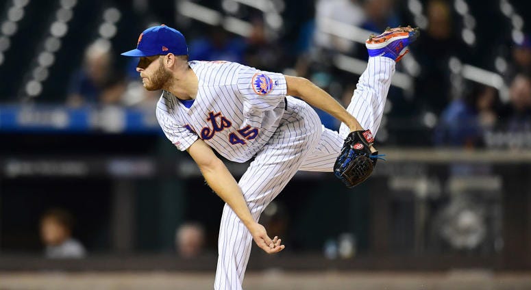 Zack Wheeler #45 of the New York Mets follows through with a pitch in the first inning of their game against the Miami Marlins at Citi Field on September 26, 2019 in the Flushing neighborhood of the Queens borough in New York City. Zack Wheeler #45 of the New York Mets follows through with a pitch in the first inning of their game against the Miami Marlins at Citi Field on September 26, 2019 in the Flushing neighborhood of the Queens borough in New York City.