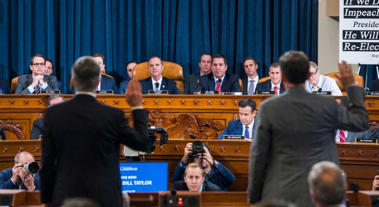 Charge d'Affaires at the US embassy in Ukraine Bill Taylor Jr., left and Deputy Assistant Secretary of State for Europe and Eurasia George Kent are sworn in to testify at a public on Nov. 13, 2019. Impeachment Hearing