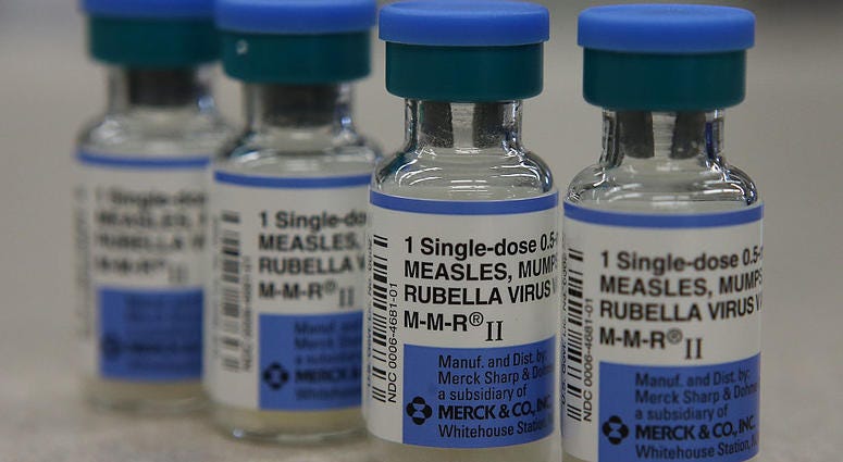 In this photo illustration, vials of measles, mumps and rubella vaccine are displayed on a counter at a Walgreens Pharmacy on January 26, 2015 in Mill Valley, California. measles, mumps and rubella vaccine