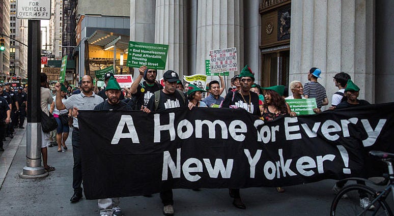 Housing activists march from Zuccotti Park to New York City's City Hall to demand more affordable housing options for the homeless and poor on September 17, 2015 in New York City. Affordable Housing March