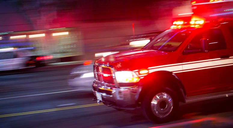 Emergency responders rush to the scene of an emergency. Ambulance