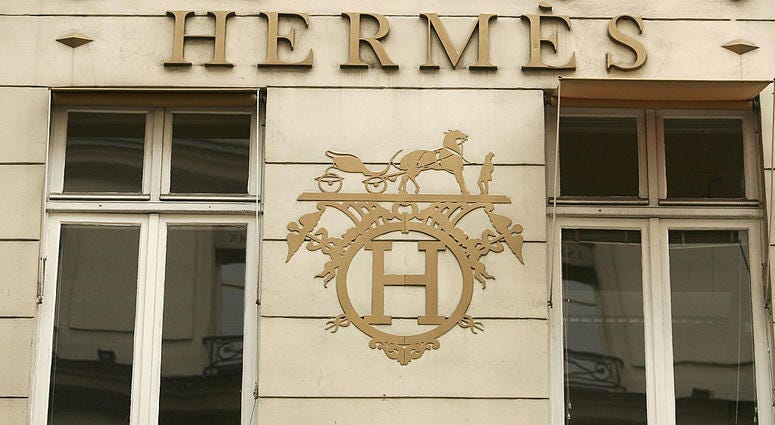 The corporate logo of Hermes is seen at the Hermes store on June 26, 2005 in Paris, France. Hermes Store