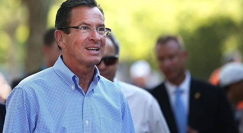 Dannel Malloy, the Governor of Connecticut, tours the grounds on day 4 of the Connecticut Open at the Connecticut Tennis Center at Yale on August 24, 2016 in New Haven, Connecticut. Gov. Dannel Malloy