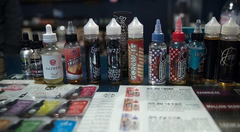 E-cigarette merchandise is displayed for sale at the Vapour Place a vaping shop in Bedminster, on December 30, 2016 in Bristol, England. Vape Juice