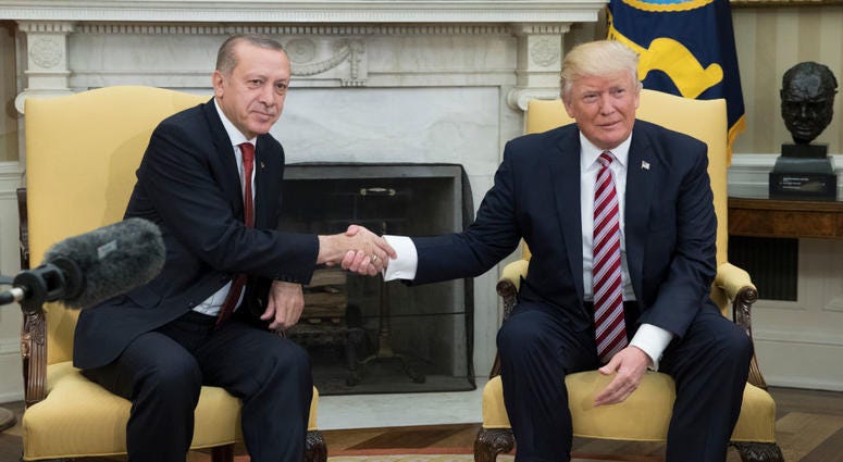 President Donald Trump, right, shakes hands with President of Turkey Recep Tayyip Erdogan in the Oval Office of the White House on May 16, 2017. Trump and Erdogan