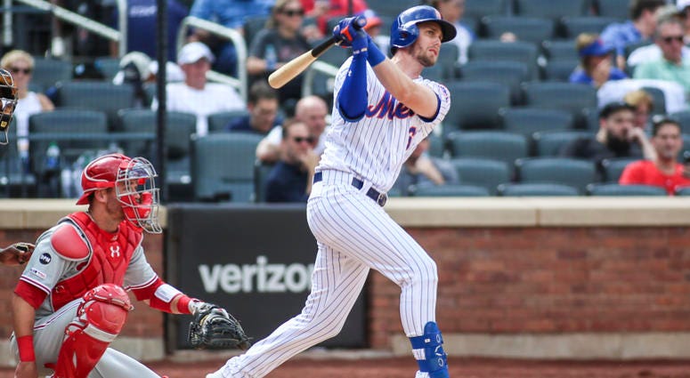 New York Mets third baseman Jeff McNeil (6) hits a single in the fourth inning against the Philadelphia Phillies at Citi Field. Mets Phillies