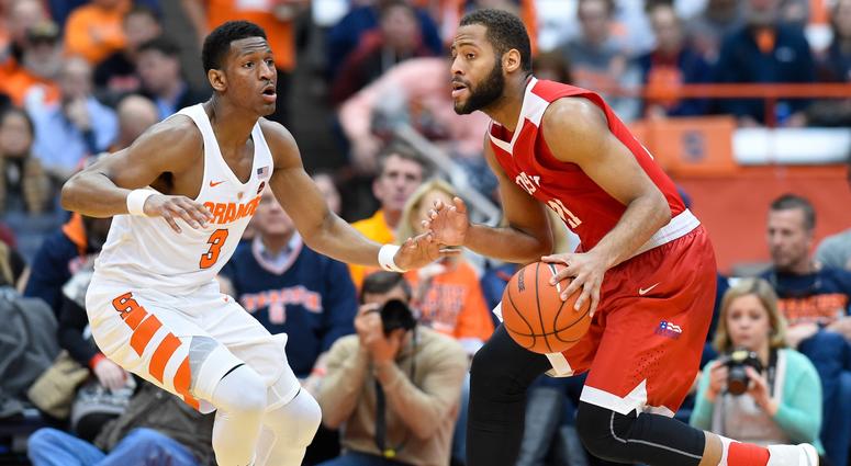 Boston University Terriers guard Cedric Hankerson (21) drives to the basket as Syracuse Orange guard Andrew White III (3) defends during at the Carrier Dome in Syracuse, New York on Dec. 10, 2016. Syracuse University Basketball