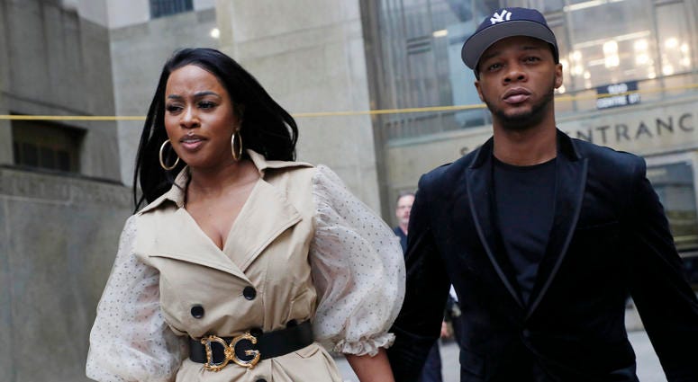 Rapper Remy Ma, left, leaves Manhattan Criminal Court, with her husband Papoose, also a rapper, after she was arraigned on a assault charge Wednesday, May 1, 2019, in New York. Remy Ma
