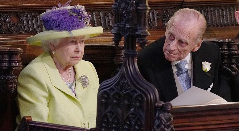 Queen Elizabeth II and Prince Phillip during the wedding service for Prince Harry and Meghan Markle at St George's Chapel, Windsor Castle. The Royal Wedding