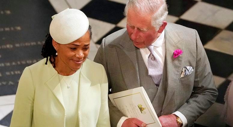 The Prince of Wales and Doria Ragland, mother of the bride, depart from St George's Chapel in Windsor Castle after the wedding of Prince Harry and Meghan Markle. The Royal Wedding