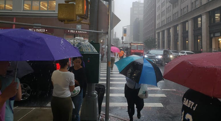 Downpour in Lower Manhattan Florence Remnants In NYC