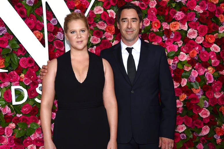 Amy Schumer and Chris Fischer