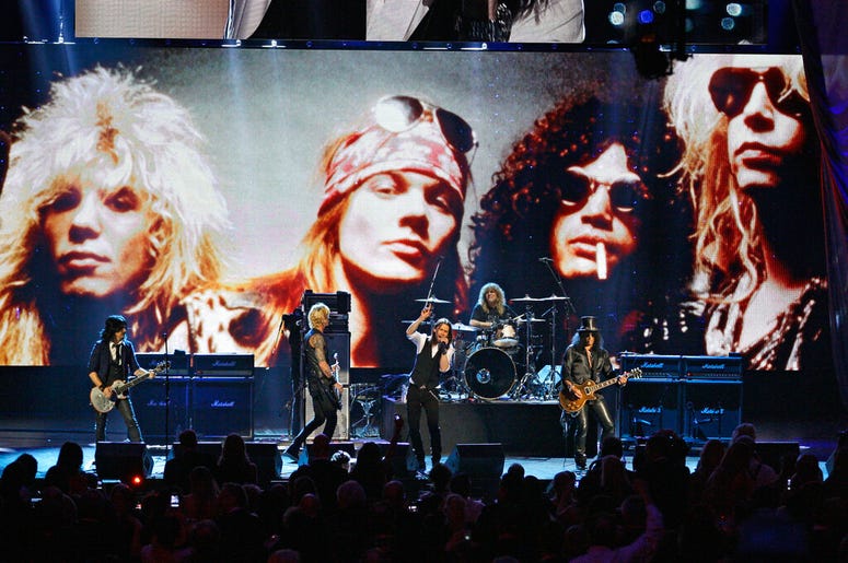 Guns N' Roses performs with singer Myles Kennedy after their induction into the Rock and Roll Hall of Fame in Cleveland