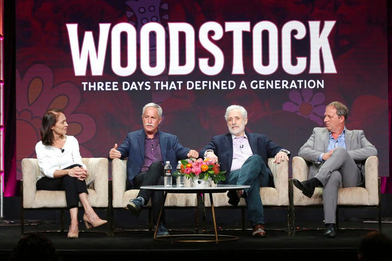 Susan Bellows, from left, author Joel Makower, Joel Rosenman, co-producer of the 1969 Woodstock festival, and director/writer/producer Barak Goodman