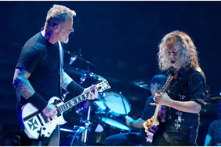 James Hetfield and Kirk Hammet of Metallica performing live on stage at Genting Arena in Birmingham, UK James Hetfield and Kirk Hammet of Metallica performing live on stage at Genting Arena in Birmingham, UK