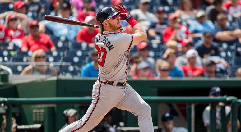 Josh Donaldson #20 of the Atlanta Braves hits the game winning home run against the Washington Nationals during the tenth inning at Nationals Park on July 31, 2019 in Washington, DC. Josh Donaldson #20 of the Atlanta Braves hits the game winning home run against the Washington Nationals during the tenth inning at Nationals Park on July 31, 2019 in Washington, DC.