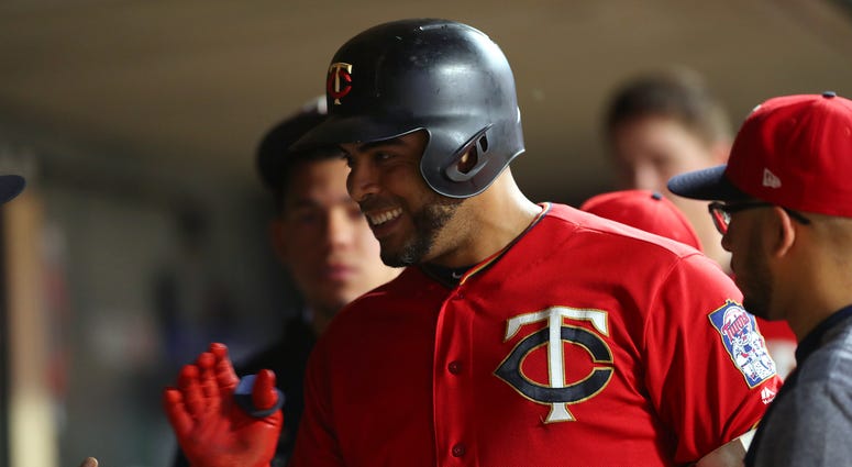 Dugout celebration with Nelson Cruz Twins DH Nelson Cruz celebrates in dugout