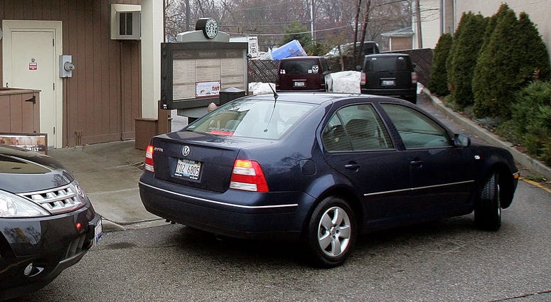 Driving thru for coffee Cars in drive through