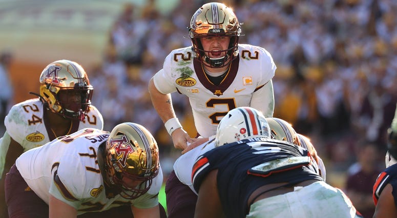 Jan 1, 2020; Tampa, Florida, USA; Minnesota Golden Gophers quarterback Tanner Morgan (2) calls a play against the Auburn Tigers during the second half at Raymond James Stadium. Gopher Football