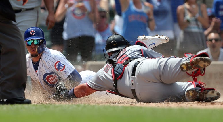 Cubs and Twins at the plate Play at the plate