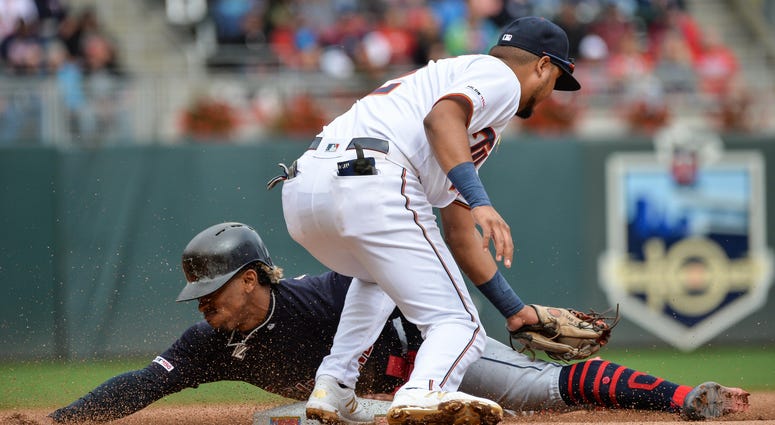 Luis Arraez fails to stop Francisco Lindor from stealing third base Francisco Lindor and Luis Arraez