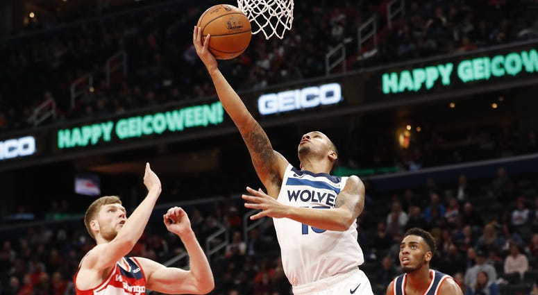 Reverse layup by Shabazz Napier of the Wolves Shabazz Napier shoots against Washington