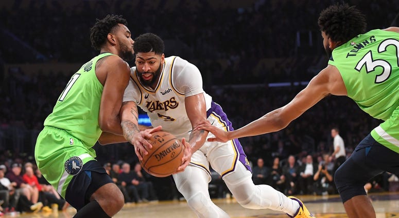 Anthony Davis drives on the Wolves The Wolves cannot stop Anthony Davis