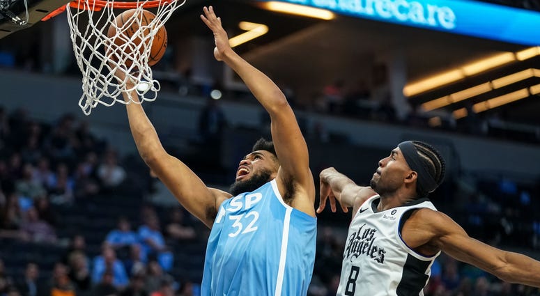 Karl-Anthony Towns goes to the rack against Maurice Harkless Karl-Anthony Towns of the Wolves beats Maurice Harkless of the Clippers