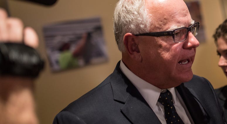 ST PAUL, MN - AUGUST 14: DFL candidate for Governor Rep. Tim Walz (D-MN) speaks with media members at his election night party on August 14, 2018 in St Paul, Minnesota. Minnesota, Connecticut, Vermont and Wisconsin held primary elections today.