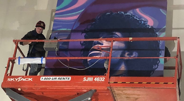 A mural of Prince being installed at MSP A mural of Prince being installed at MSP