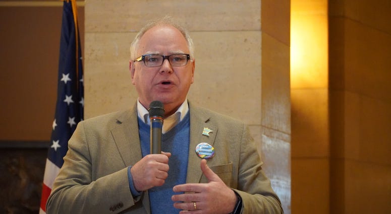 Governor Tim Walz with mic