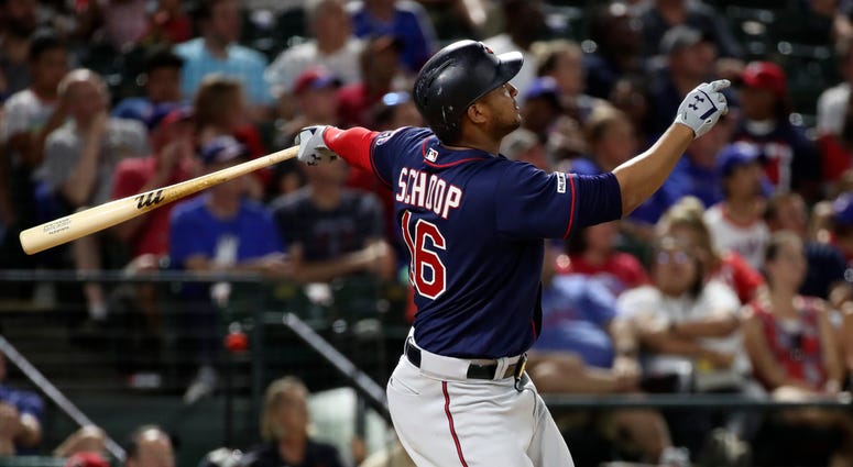 Aug 16, 2019; Arlington, TX, USA; Minnesota Twins second baseman Jonathan Schoop (16) hits a two run home run during the seventh inning against the Texas Rangers at Globe Life Park in Arlington.