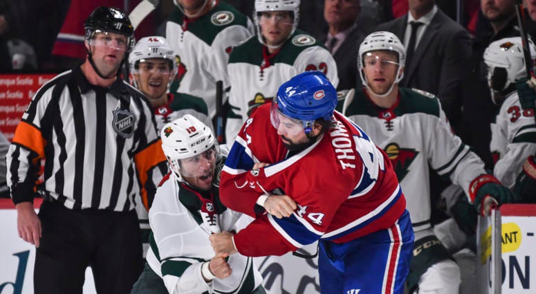 Luke Kunin of the Wild in a fight with Nate Thompson of fhe Wild Luke Kunin upholds the honor of the Wild