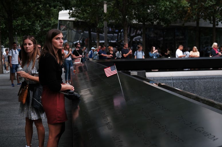 People walk on the grounds of the September 11 Memorial and Museum on September 05, 2019 in New York City. New York City is preparing to commemorate the 18th anniversary of the attacks on the World Trade Center in which 2,996 people were killed and over People walk on the grounds of the September 11 Memorial and Museum on September 05, 2019 in New York City. New York City is preparing to commemorate the 18th anniversary of the attacks on the World Trade Center in which 2,996 people were killed and over