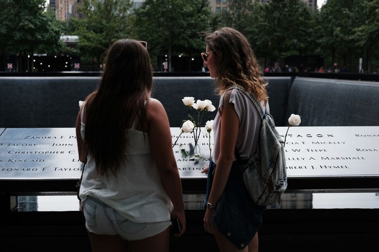 People walk on the grounds of the September 11 Memorial and Museum on September 05, 2019 in New York City. New York City is preparing to commemorate the 18th anniversary of the attacks on the World Trade Center in which 2,996 people were killed and over 6 People walk on the grounds of the September 11 Memorial and Museum on September 05, 2019 in New York City. New York City is preparing to commemorate the 18th anniversary of the attacks on the World Trade Center in which 2,996 people were killed and over 6