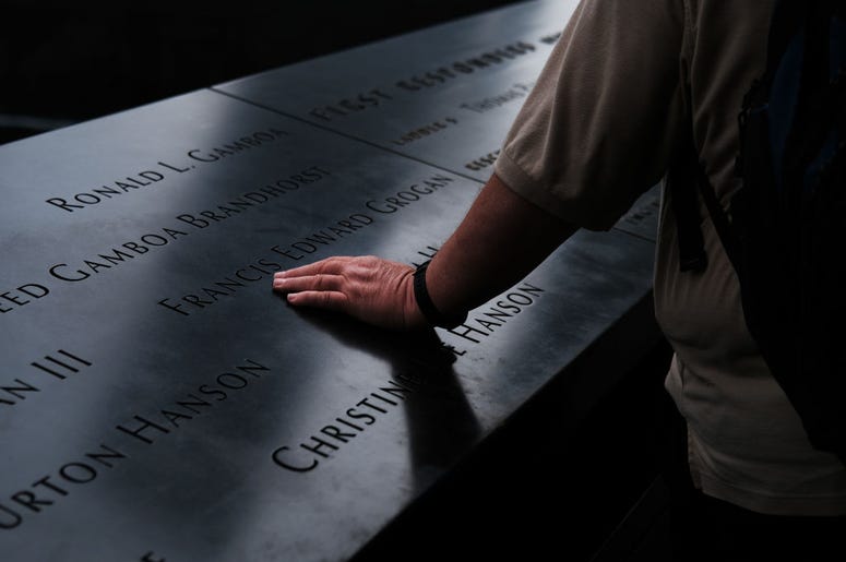 People walk on the grounds of the September 11 Memorial and Museum on September 05, 2019 in New York City. New York City is preparing to commemorate the 18th anniversary of the attacks on the World Trade Center in which 2,996 people were killed and over 6 People walk on the grounds of the September 11 Memorial and Museum on September 05, 2019 in New York City. New York City is preparing to commemorate the 18th anniversary of the attacks on the World Trade Center in which 2,996 people were killed and over 6
