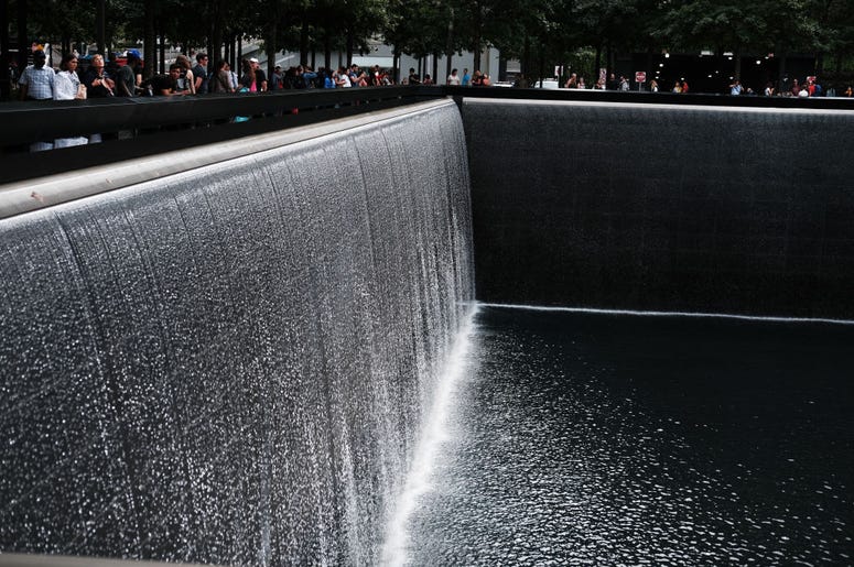 People walk on the grounds of the September 11 Memorial and Museum on September 05, 2019 in New York City. New York City is preparing to commemorate the 18th anniversary of the attacks on the World Trade Center in which 2,996 people were killed and over 6 People walk on the grounds of the September 11 Memorial and Museum on September 05, 2019 in New York City. New York City is preparing to commemorate the 18th anniversary of the attacks on the World Trade Center in which 2,996 people were killed and over 6