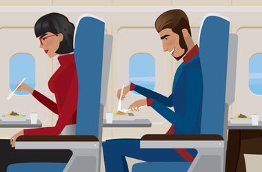 Woman and Man On Airplane