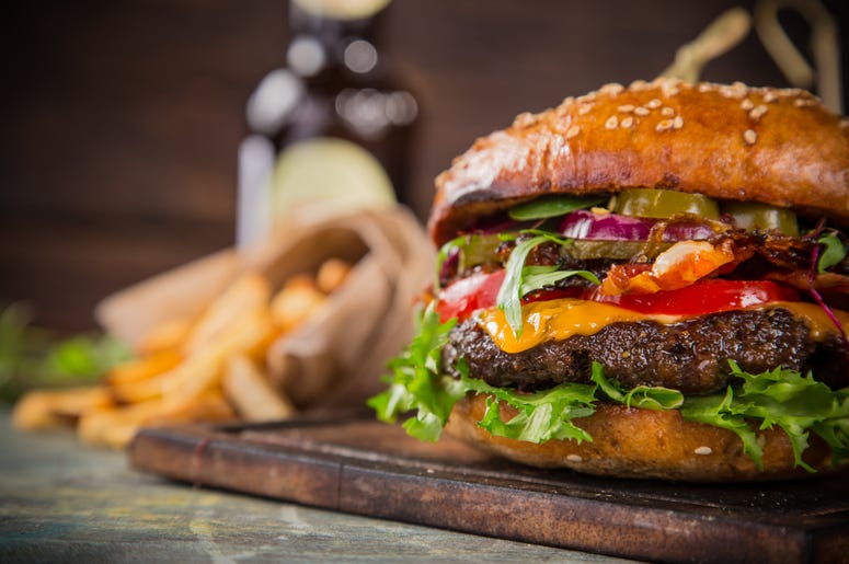 Burger On A Wood Table