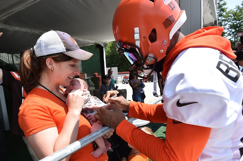 Cleveland Browns wide receiver Odell Beckham (13) signs an autograph during training camp at the Cleveland Browns Training Complex. Cleveland Browns wide receiver Odell Beckham (13) signs an autograph during training camp at the Cleveland Browns Training Complex.