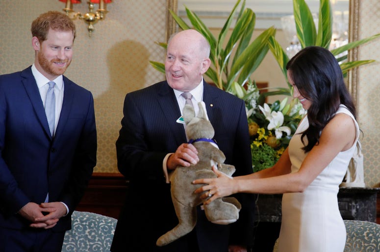 Australia's Governor General Peter Cosgrove gives the Duke and Duchess of Sussex a toy kangaroo - with a baby - at Admiralty House in Sydney on the first day of the royal couple's visit to Australia Australia's Governor General Peter Cosgrove gives the Duke and Duchess of Sussex a toy kangaroo - with a baby - at Admiralty House in Sydney on the first day of the royal couple's visit to Australia
