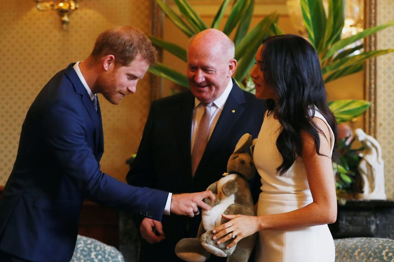Australia's Governor General Peter Cosgrove gives the Duke and Duchess of Sussex a toy kangaroo - with a baby - at Admiralty House in Sydney on the first day of the royal couple's visit to Australia Australia's Governor General Peter Cosgrove gives the Duke and Duchess of Sussex a toy kangaroo - with a baby - at Admiralty House in Sydney on the first day of the royal couple's visit to Australia