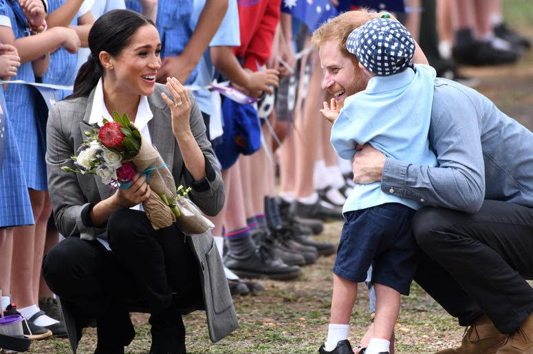 Prince Harry Duke of Sussex and Meghan Duchess of Sussex arrive at Dubbo Airport where they meet Luke Vincent, 5, from Buninyong Public School Kindergarten, New South Wales, Australia. Prince Harry Duke of Sussex and Meghan Duchess of Sussex arrive at Dubbo Airport where they meet Luke Vincent, 5, from Buninyong Public School Kindergarten, New South Wales, Australia.