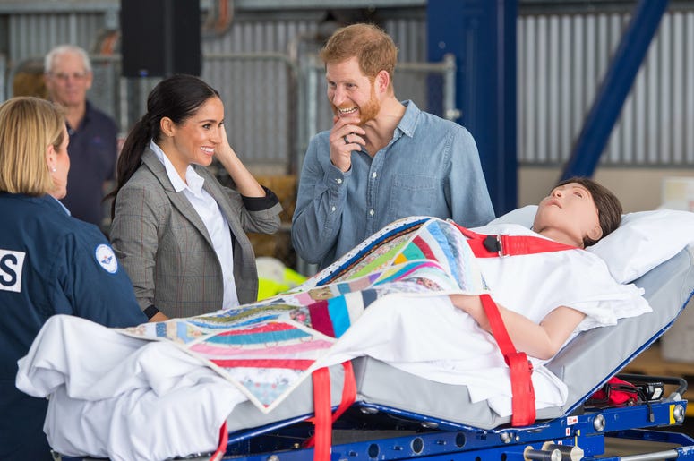 he Duke and Duchess of Sussex look at a medical training aid designed to simulate a pregnant patient as they attend the naming and unveiling of a new Royal Flying Doctor Service aircraft at Dubbo City Regional Airport, in Dubbo, New South Wales, on the se he Duke and Duchess of Sussex look at a medical training aid designed to simulate a pregnant patient as they attend the naming and unveiling of a new Royal Flying Doctor Service aircraft at Dubbo City Regional Airport, in Dubbo, New South Wales, on the se
